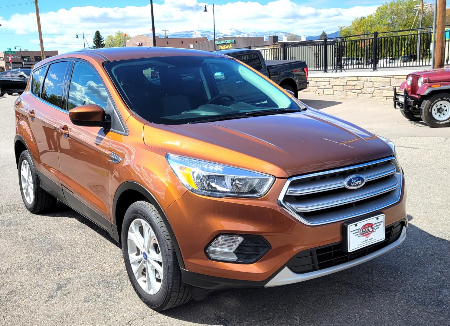 2017 Copper /Black Ford Escape SE (1FMCU9GD1HU) with an 1.5L I4 engine, 6 Speed Auto transmission, located at 450 N Russell, Missoula, MT, 59801, (406) 543-6600, 46.874496, -114.017433 - Nice Low Mile All Wheel Drive. Only 59K Miles. 1.5L I4 Engine. 6 Speed Automatic Transmission. Very Clean. Power drivers Seat. Air. Cruise. Tilt. Power Windows and Locks. Backup Camera. - Photo#4